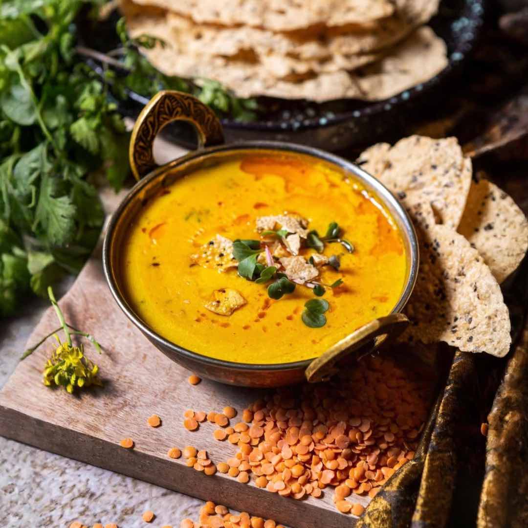 Lentil curry (Dal Tadka) garnished with fresh coriander, served at Shakinah Indian restaurant in Malta