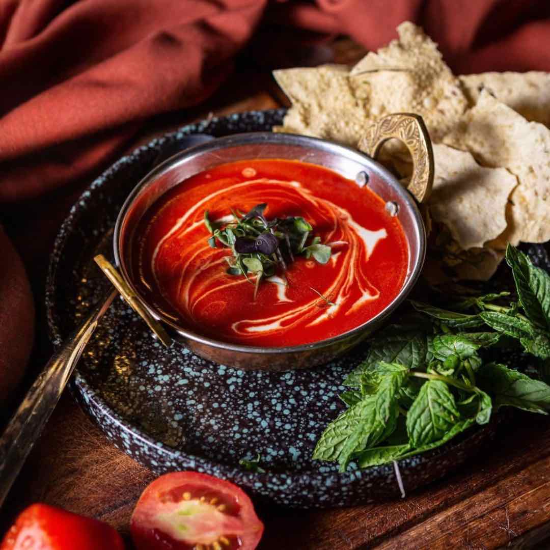 Chicken Tikka Masala curry with tender chicken pieces in a creamy tomato-based sauce, served at Shakinah Indian restaurant in Malta