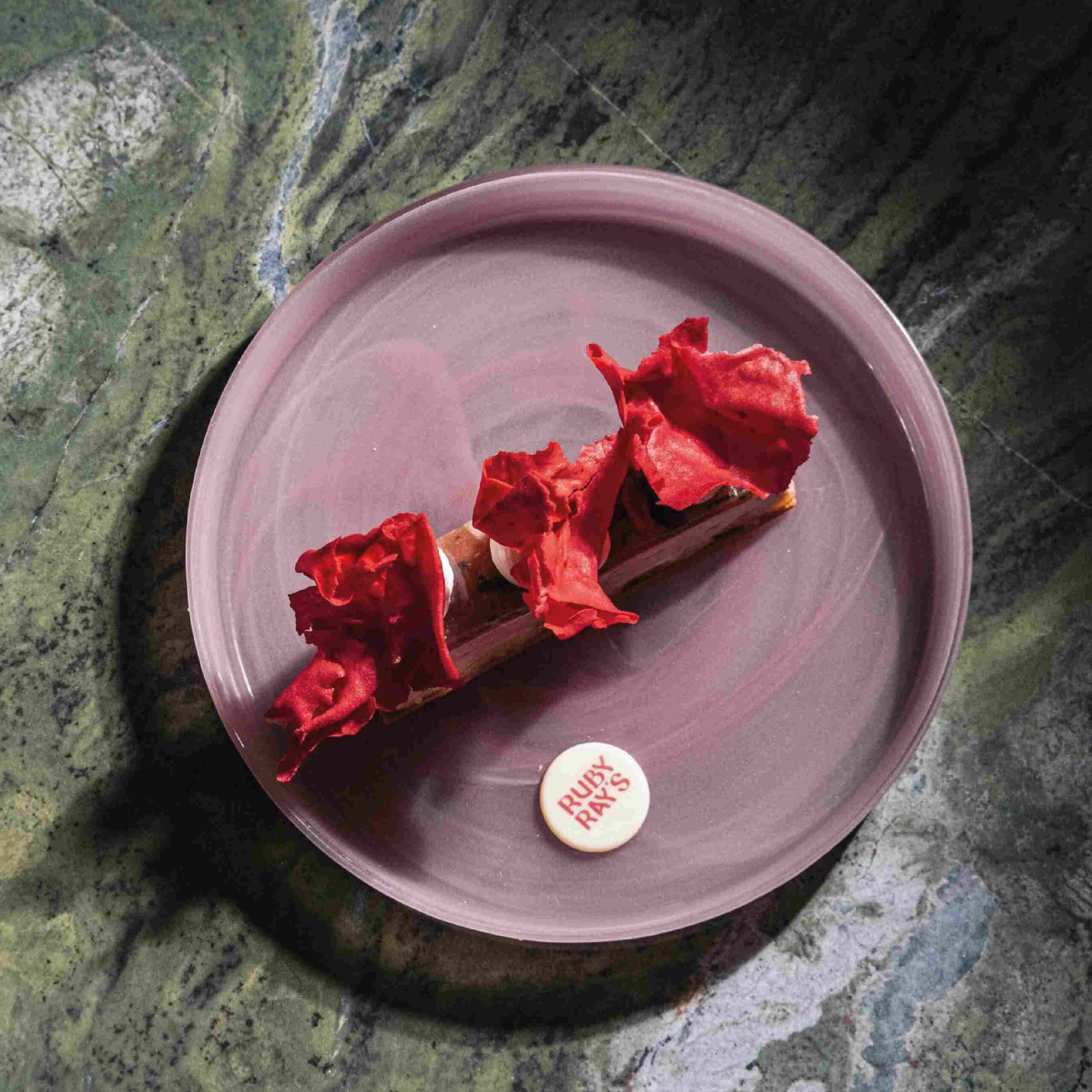 Chandelier-inspired dessert reflecting Ruby Rays private dining ambiance in St. Julian’s, Malta
